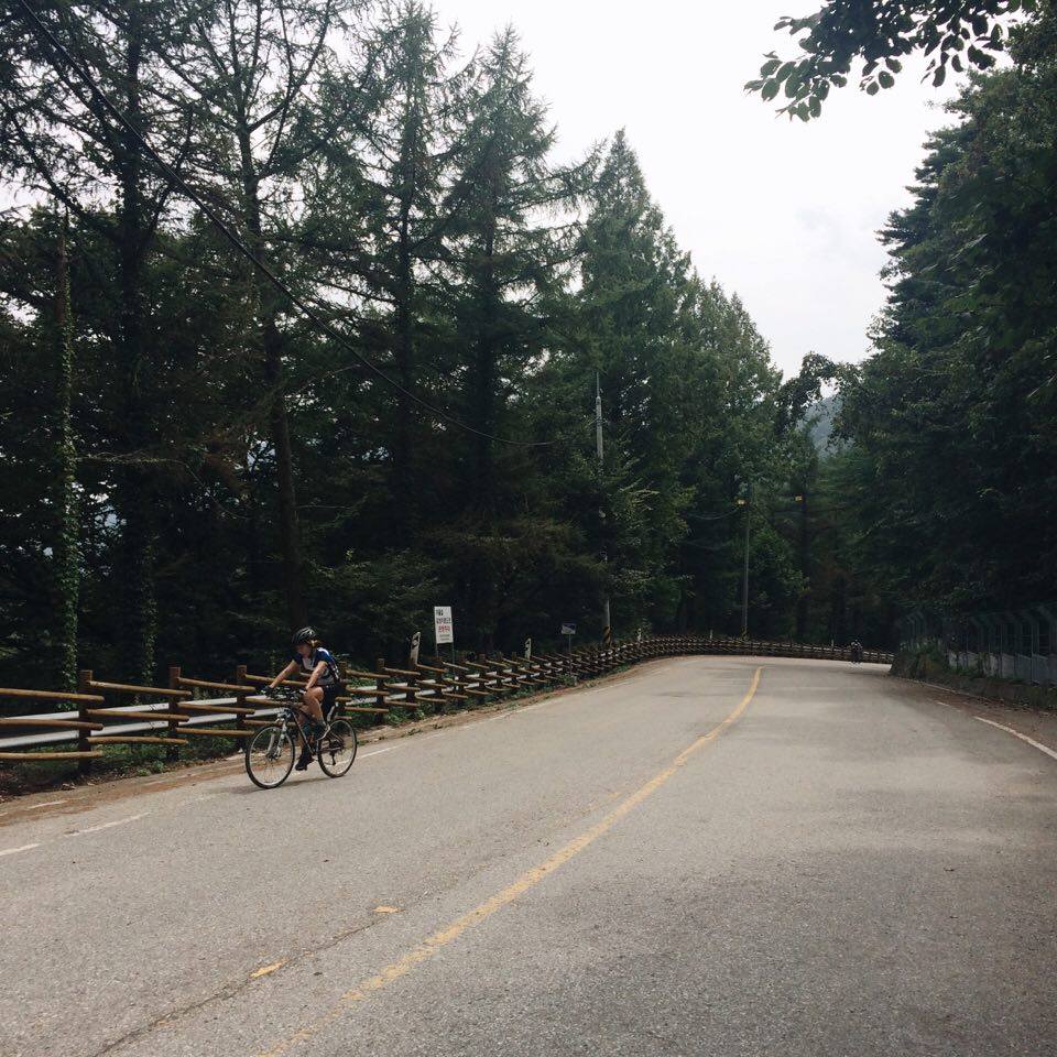  Riders reaching the top of the hill. 